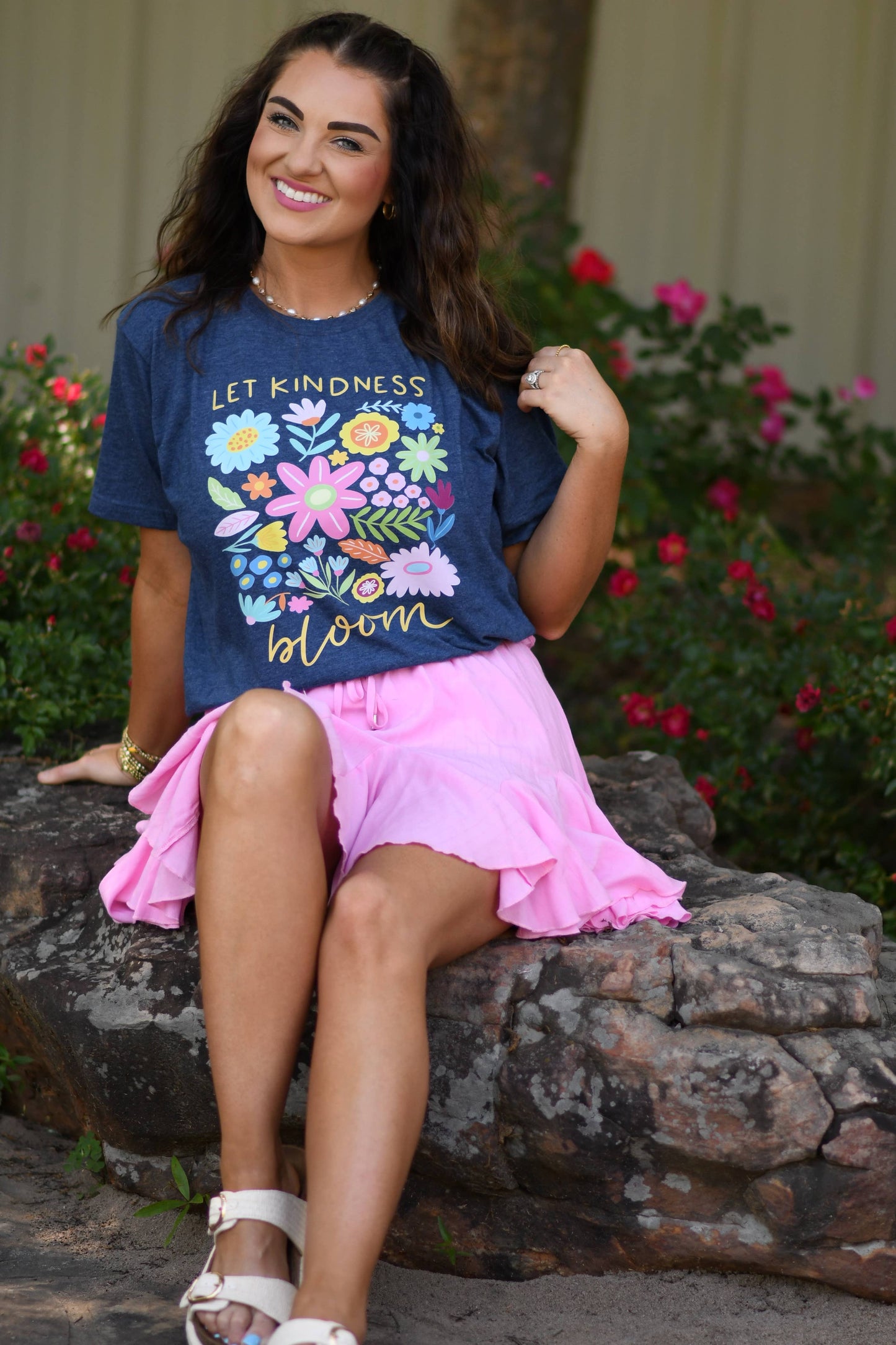 Let Kindness Bloom Floral Tee on a model.