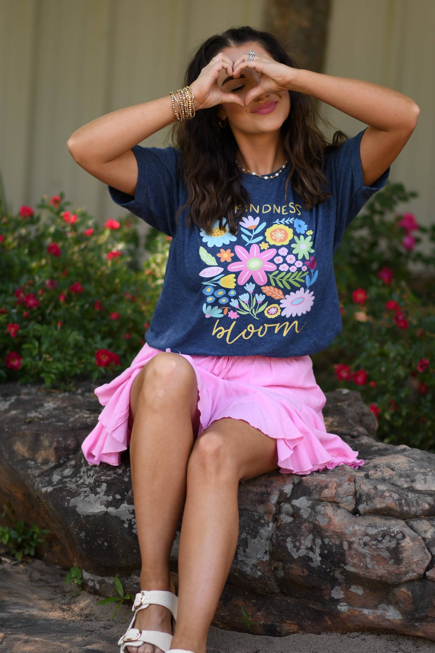 Let Kindness Bloom Floral Tee on a model.